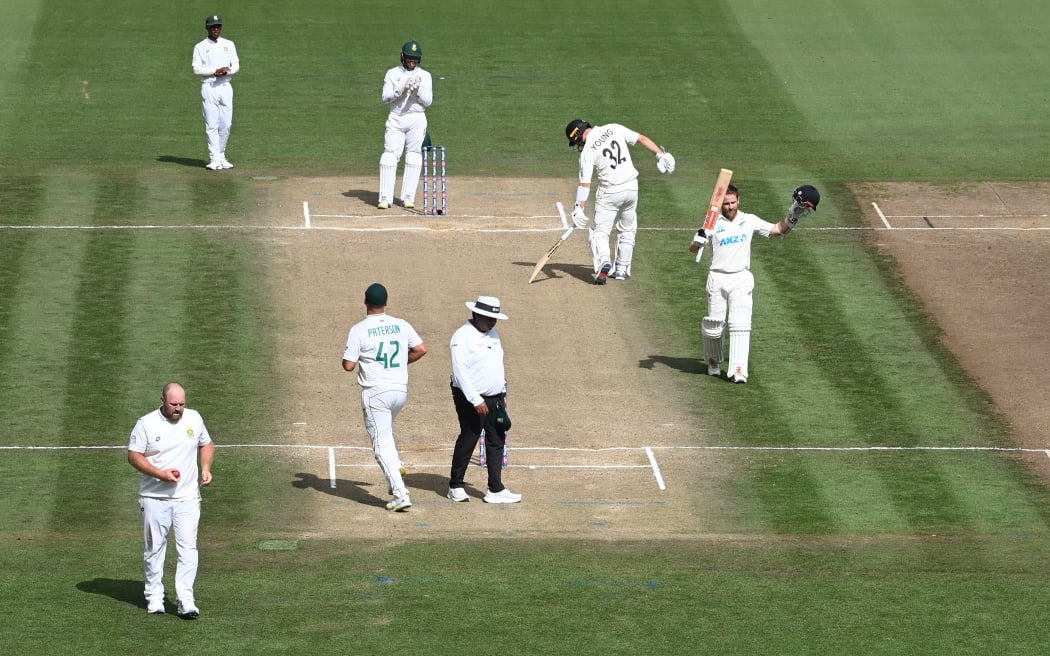 Kane Williamson acknowledges the applause of the Seddon Park crowd after bringing up his 32nd test century.