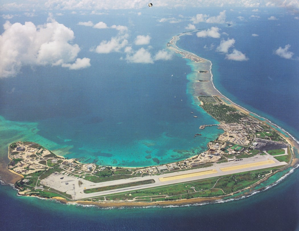 Aerial view of the main island in Kwajalein Atoll, which is the headquarters for the U.S. Army's Reagan Test Site, an important missile defense facility. Fish in the lagoon area of the base have been found to have high levels of chemical contamination.