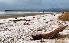 Snow on New Brighton beach, Christchurch, on Tuesday.