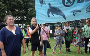 Tina Ngata leads the group of protesters.