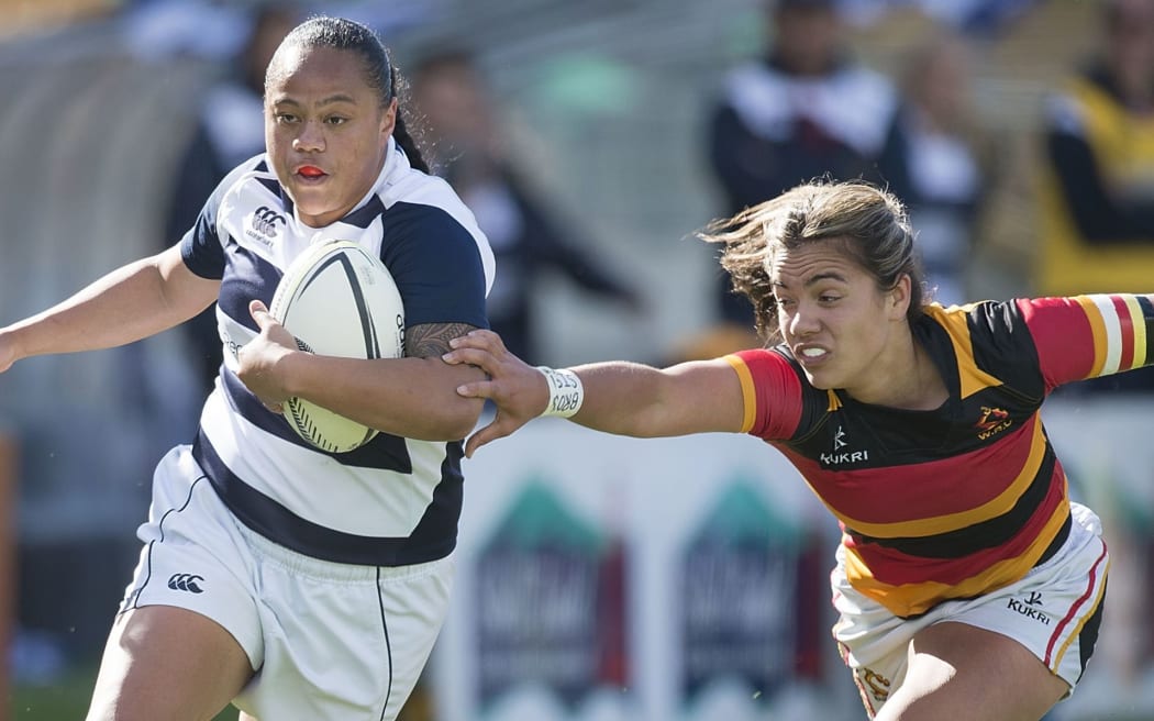 Mele Hufanga of Auckland is tackled by Stacey Waaka of Waikato