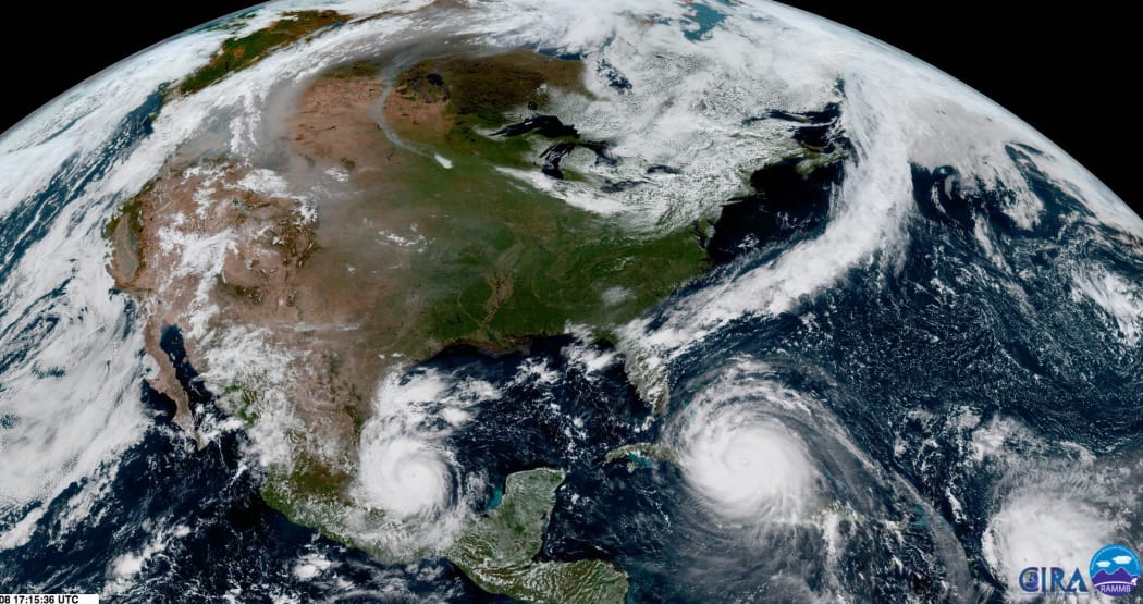 Satellite imagery from the US National Oceanic and Atmospheric Administration shows Hurricanes Irma, Jose and Katia over the Atlantic Ocean