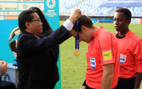 OFC President David Chung (L).
