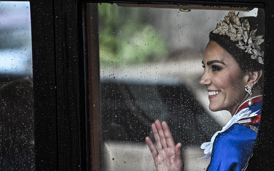 Britain's Catherine, Princess of Wales returns back to Buckingham Palace from Westminster Abbey in central London on May 6, 2023, after the coronations of Britain's King Charles III and Britain's Queen Camilla. - The set-piece coronation is the first in Britain in 70 years, and only the second in history to be televised. Charles will be the 40th reigning monarch to be crowned at the central London church since King William I in 1066. Outside the UK, he is also king of 14 other Commonwealth countries, including Australia, Canada and New Zealand. Camilla, his second wife, was crowned alongside him, and will now be known as Queen Camilla. (Photo by Paul ELLIS / AFP)