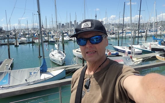 Bruce tests out his injury on a walk around the Auckland waterfront.