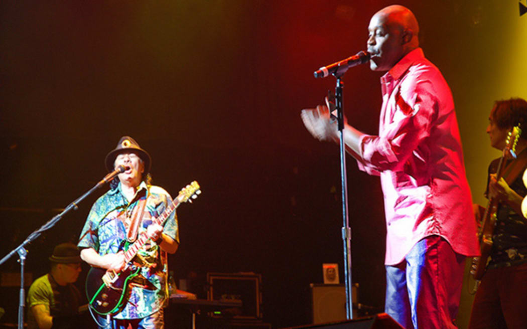 Tony Lindsay, performing with Carlos Santana, in Santana.