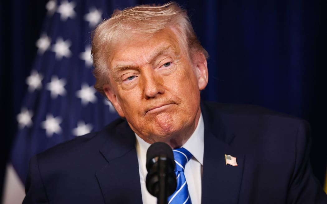 President Donald Trump attends a press conference at Mar-a-Lago club in Palm Beach, Florida, on December 28, 2025.