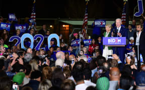 Democratic presidential hopeful former Vice President Joe Biden, flanked by his wife Jill (L) and sister Valerie, addresses a Super Tuesday event in Los Angeles on March 3, 2020.
