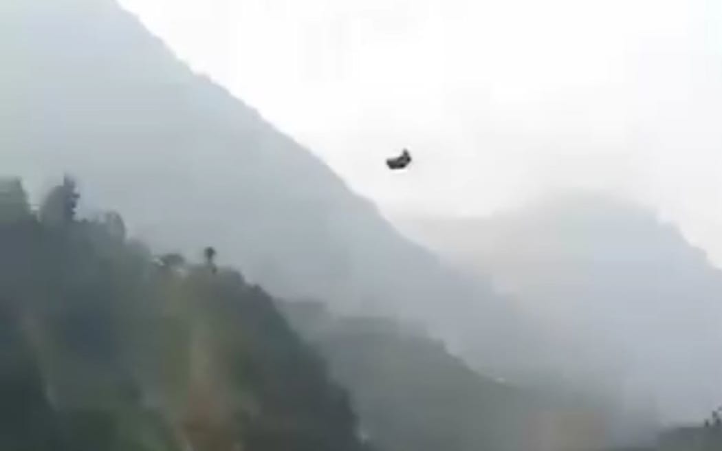 Helicopters have been sent to rescue eight people trapped in cable car over a valley in the Khyber Pakhtunkhwa province.