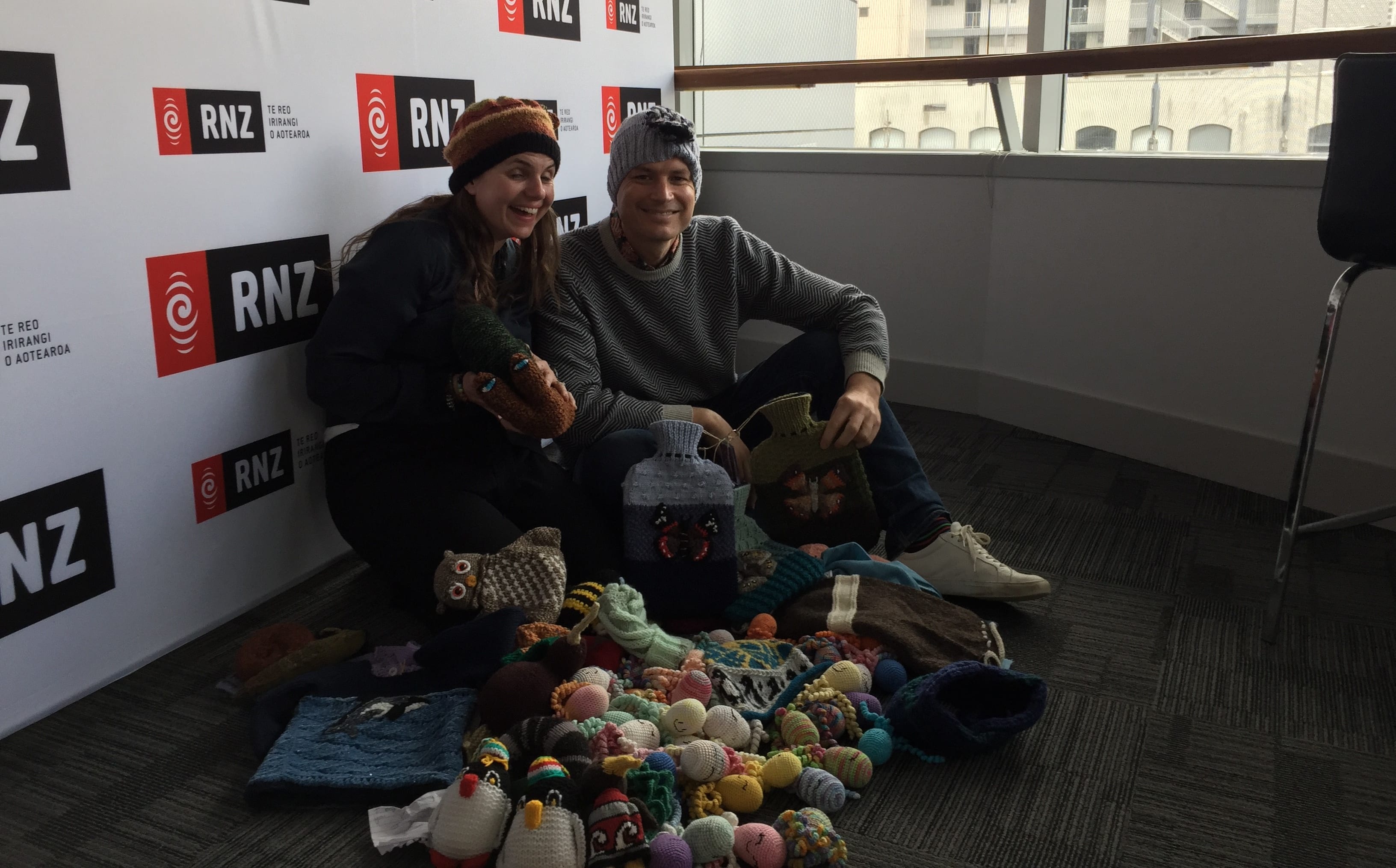 Nicola Toki and Jesse Mulligan with some of the Knit a Critter entries