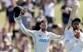 Blackcaps Devon Conway celebrates 100 runs during play on day one of the first cricket test between Bangladesh and New Zealand at Bay Oval