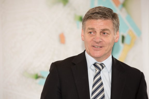 Bill English at a social housing announcement in Northcote