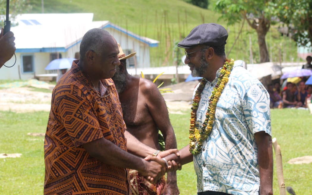Current Vanuatu prime minister Israel Kalsakau, left, with former PM Charlot Salwai