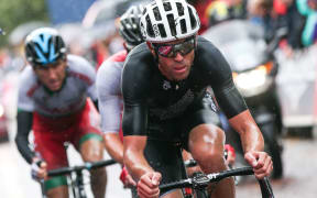 Jack Bauer on his way to winning a silver medal in the road race at the 2014 Commonwealth Games in Glasgow.