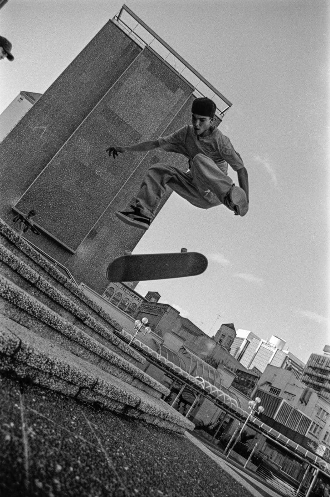 Kickflip down the stairs in Aotea Square.