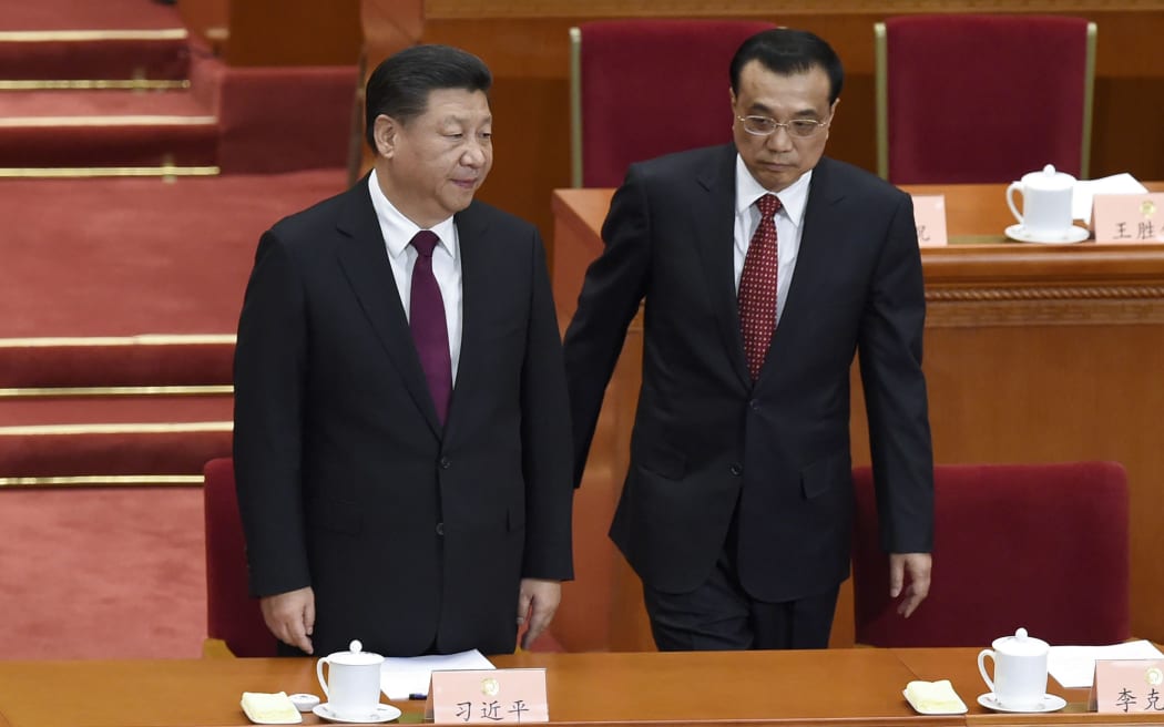 China's President Xi Jinping and Premier Li Keqiang arrive for the opening session of the China's People's Political Consultative Conference (CPPCC) at the Great Hall of the People in Beijing.