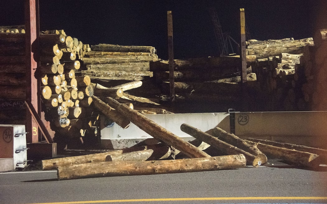 A collapsed pile of logs at a Wellington wharf.