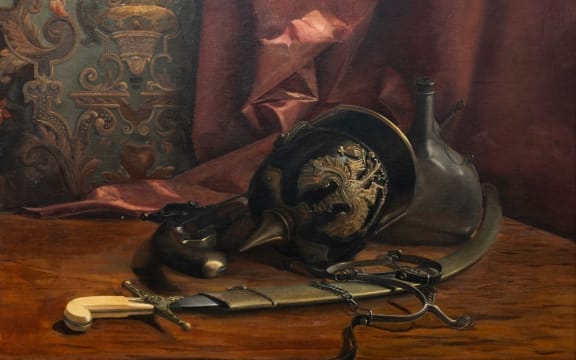 An oil painting of a military helmet, old flintlock holster pistol, spurs, scimitars in a brass case, and a water bottle. A red curtain is in the background with detailed wall decorations.
