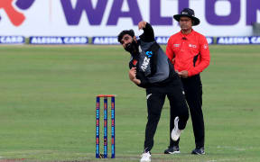 Ajaz Patel bowling.
