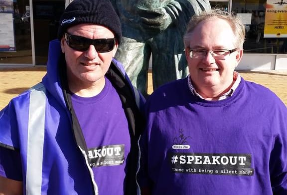 Kelvin Davis (left) with fellow marcher Eric Bolt as the hikoi reaches Orewa.