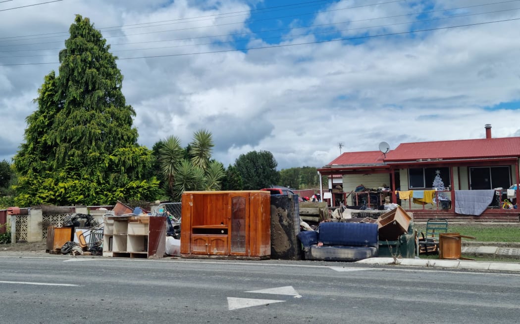 Flood damaged property is piling up on the streets of Omahu in Hawkes Bay.