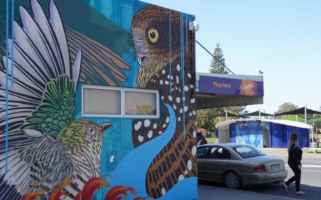 It’s hard to find a wall in Awanui these days that isn’t decorated with a mural or giant-sized historic photos.