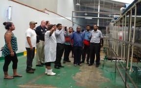Business and government fisheries department representatives attending a tuna canning training in Majuro received a tour of the Pan Pacific Foods tuna loining plant.
