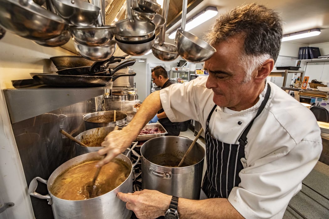 Chef Phil Hazeldine prepares the dishes for the hunters.