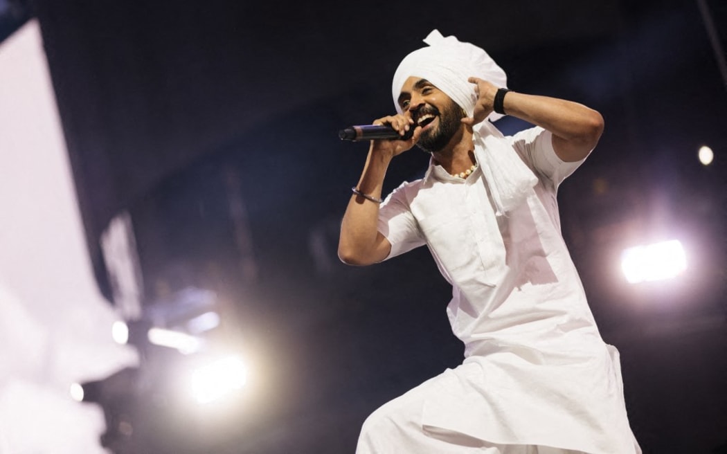 INDIO, CALIFORNIA - APRIL 22: Diljit Dosanjh performs at the Sahara tent during the 2023 Coachella Valley Music and Arts Festival on April 22, 2023 in Indio, California.   Matt Winkelmeyer/Getty Images for Coachella/AFP (Photo by Matt Winkelmeyer / GETTY IMAGES NORTH AMERICA / Getty Images via AFP)