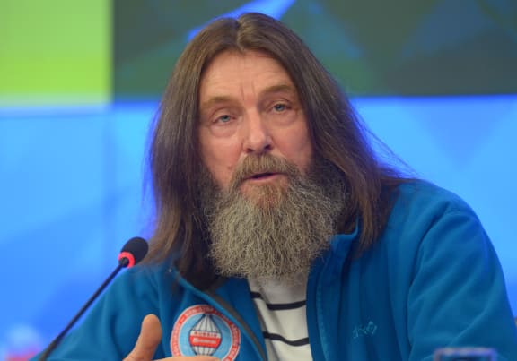 Russian Fyodor Konyukhov has recorded the fastest circumnavigation of the planet in a hot-air balloon.