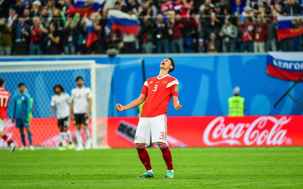 Ilya Kutepov of Russia celebrating a goal against Egypt.