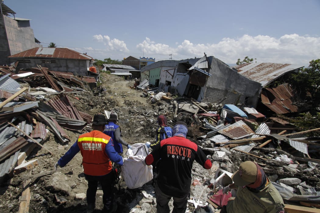 The death toll from the 7.7-magnitude earthquake and tsunami on the island of Sulawesi has risen to 1,203, the country's disaster management agency said on Sunday.