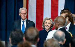 WASHINGTON, DC - JANUARY 20: Former President Bill Clinton and former first lady Hillary Clinton attend the inauguration of U.S. President-elect Donald Trump in the U.S. Capitol Rotunda on January 20, 2025 in Washington, DC. Donald Trump takes office for his second term as the 47th President of the United States.   Kenny Holston-Pool/Getty Images/AFP (Photo by POOL / GETTY IMAGES NORTH AMERICA / Getty Images via AFP)