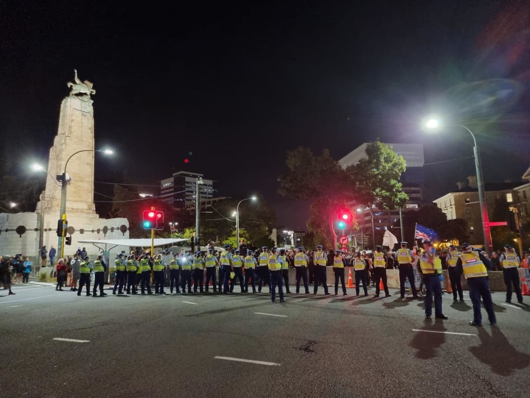 Protesters faced off with police around Lambton Quay as police tried to move a concrete block on 23 February, 2022.