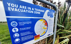 A sign detailing a Tsunami Evacuation Zone.