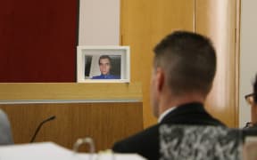 A framed photo of Nick Evans, who's the subject of the coronial inquest.