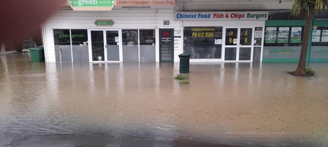 Flooded shops in Kumeū today.