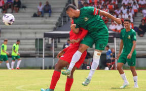 Cook Islands men's national football team in action against Tonga.