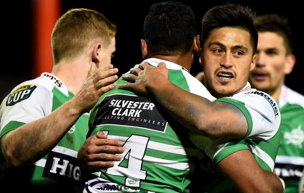 The Manawatu Turbos celebrate a try.