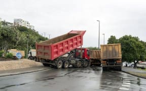 Truck blockade lifted temporarily in New Caledonia.