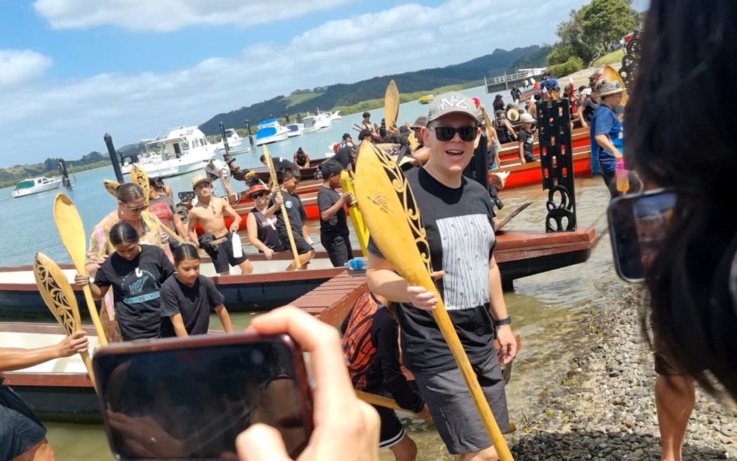 Labour leader Chris Hipkins disembarking from a waka at Waitangi on 4 February 2024.
