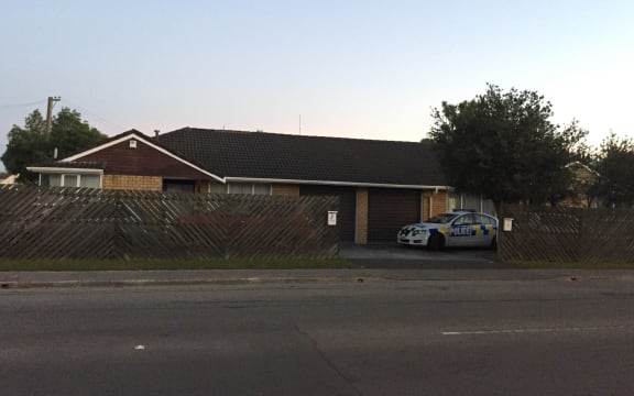 A police car outside the house on Wainoni Road in Christchurch,