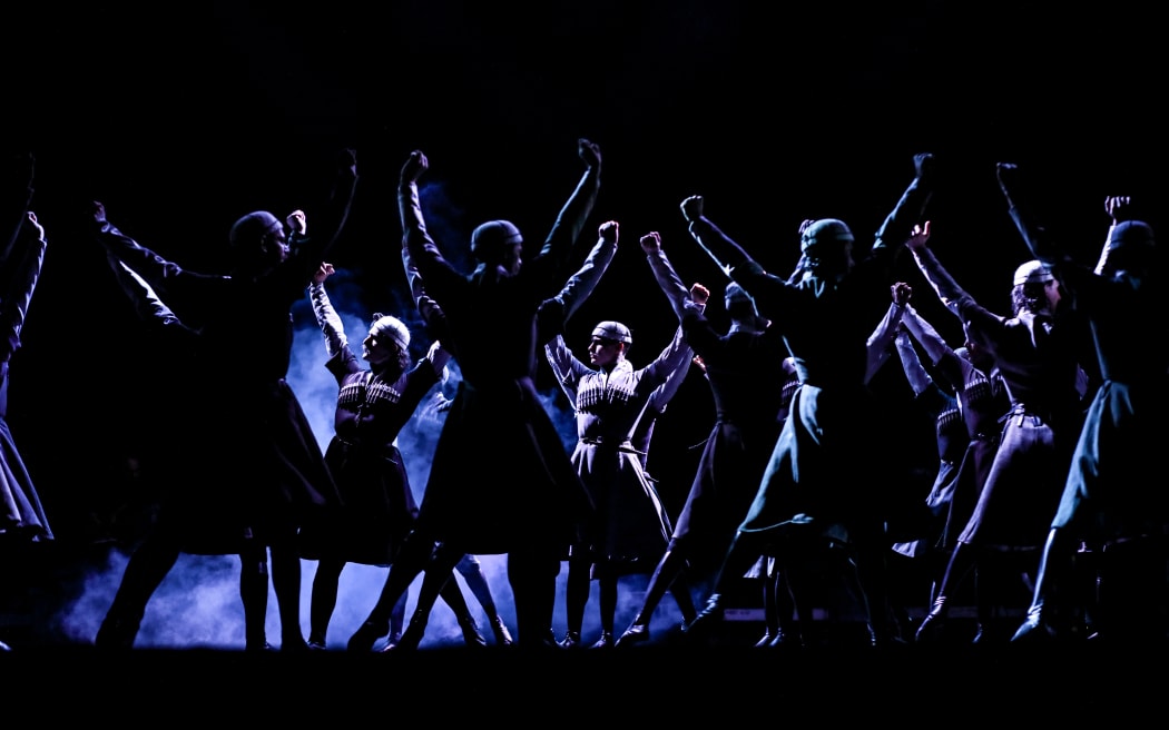 With arms lifted in perfect unison, the dancers present Svanuri, an iconic expression of collective strength