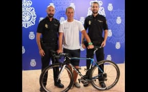 Local police with the specialist bike that was found in a second-hand store.