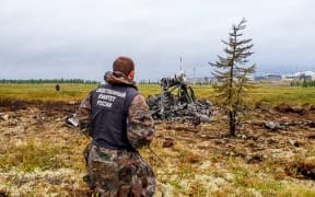 n its way to an oil station in northern Siberia in the early hours of the morning.  The Russian Transport Ministry said the Mi-8 helicopter carrying three crew members and 15 passengers crashed when it collided with machinery carried by another helicopter soon after take-off.