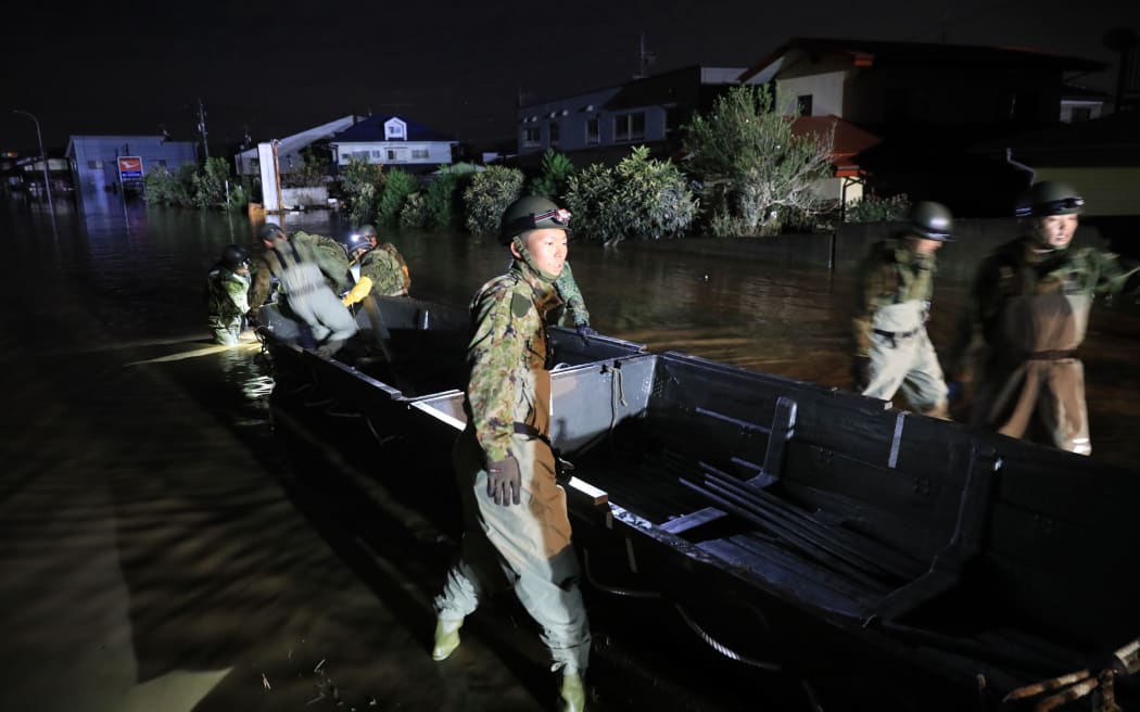 Self-Defense Forces Personnel conduct rescue operation at area flooded by the Chikuma river overflown in Nagano City, Nagano prefecture on Oct. 13, 2019, one day after Typhoon No. 19, known as Typhoon Hagibis, a powerful super typhoon, made a landfall.