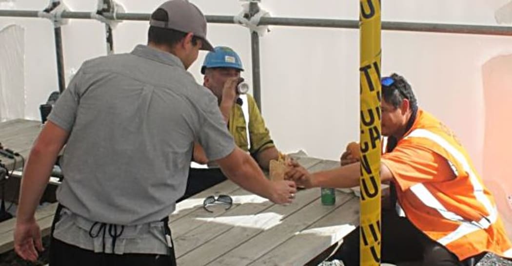 Young prisoner "SB" hands  over chips for morning tea.