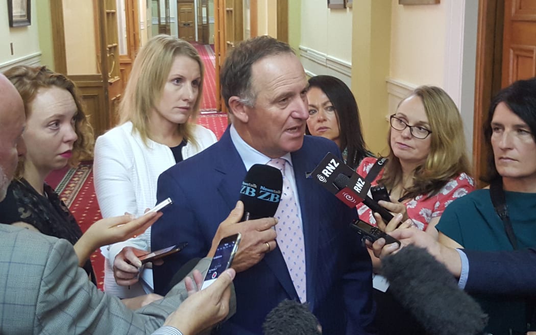 Prime Minister John Key talks to reporters at Parliament