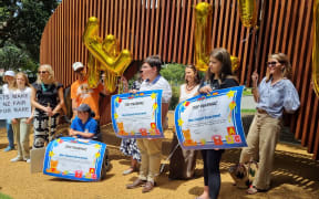 Protesters appeared at Parliament today to protest a review of how children's cancer medicine is funded.