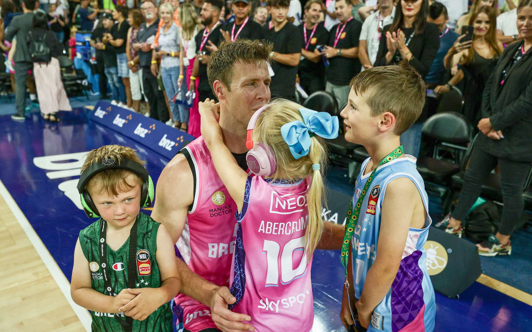 Tom Abercrombie of the Breakers is greeted by his children